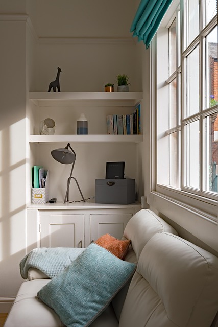 DIY homeowner upgrading living room shelving in Toronto condo